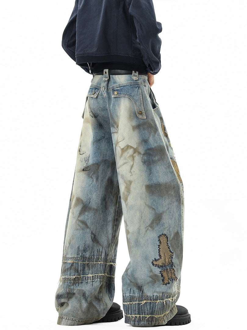Ace Jolun Heavy‑Embroidered Curved‑Cut Jeans