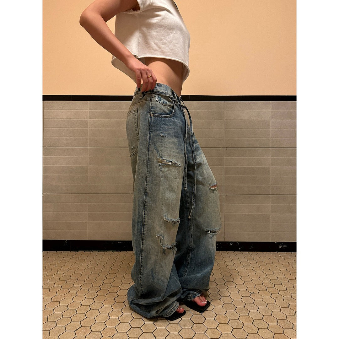 Ace Jolun Washed Whiskered Ripped Curved‑Cut Jeans