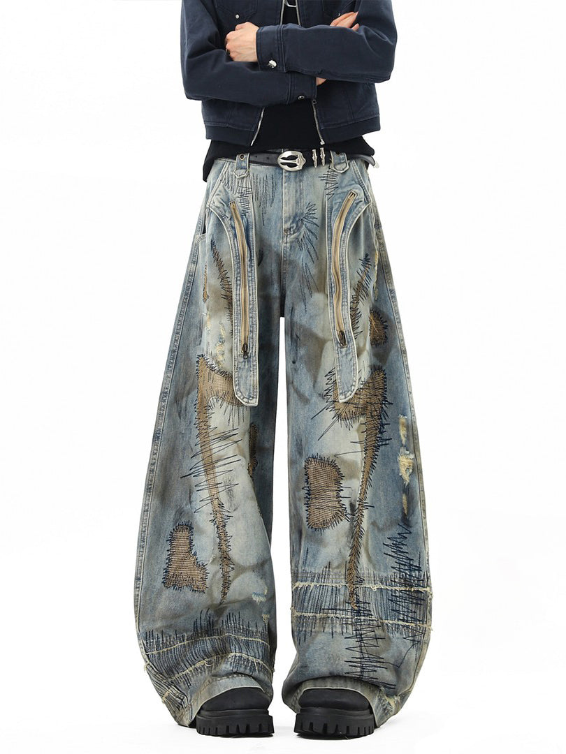 Ace Jolun Heavy‑Embroidered Curved‑Cut Jeans