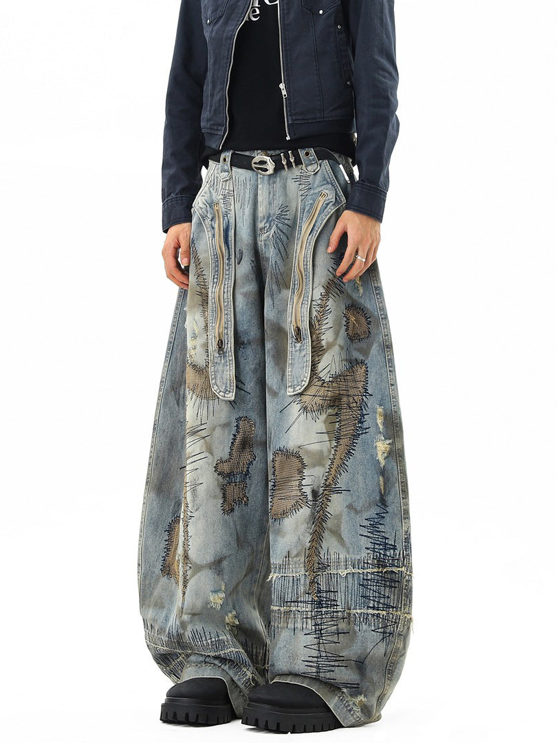 Ace Jolun Heavy‑Embroidered Curved‑Cut Jeans