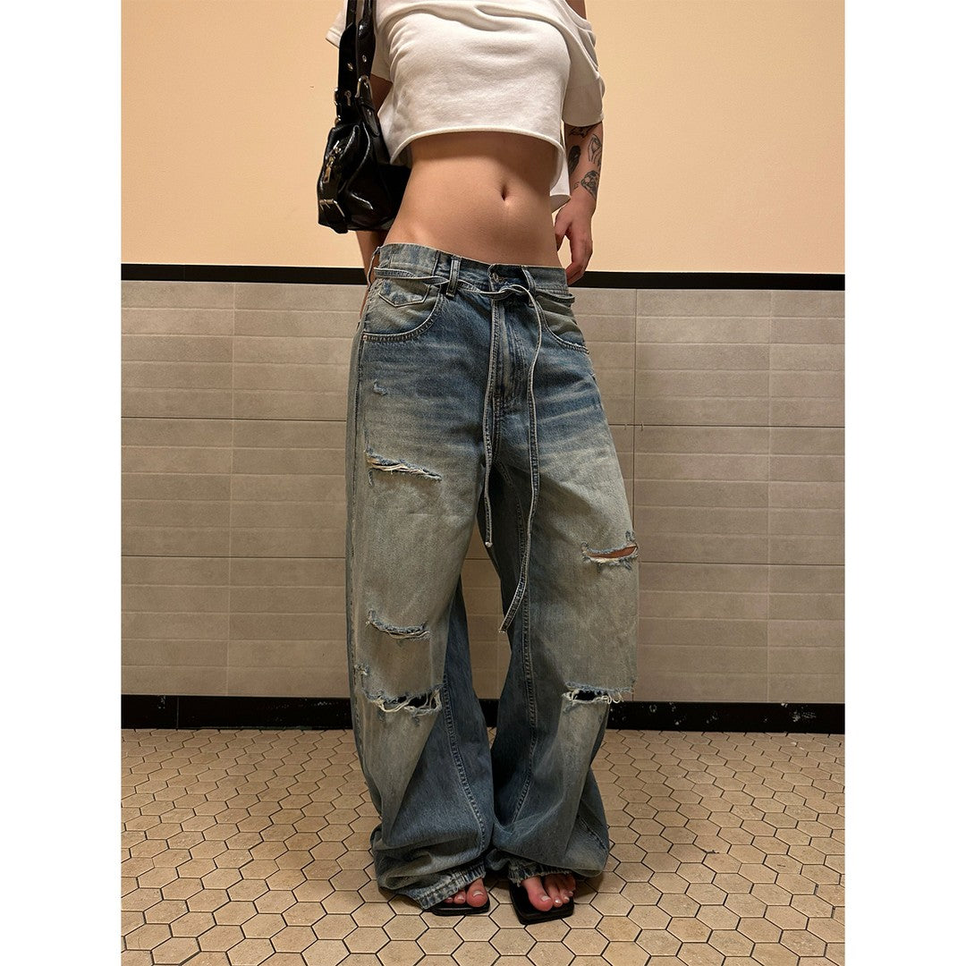 Ace Jolun Washed Whiskered Ripped Curved‑Cut Jeans
