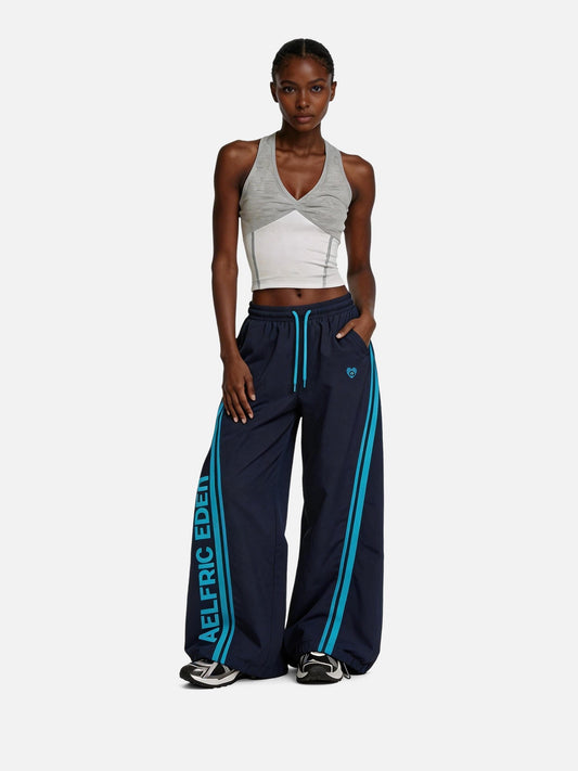Pantalones deportivos holgados a rayas Aelfric Eden Team