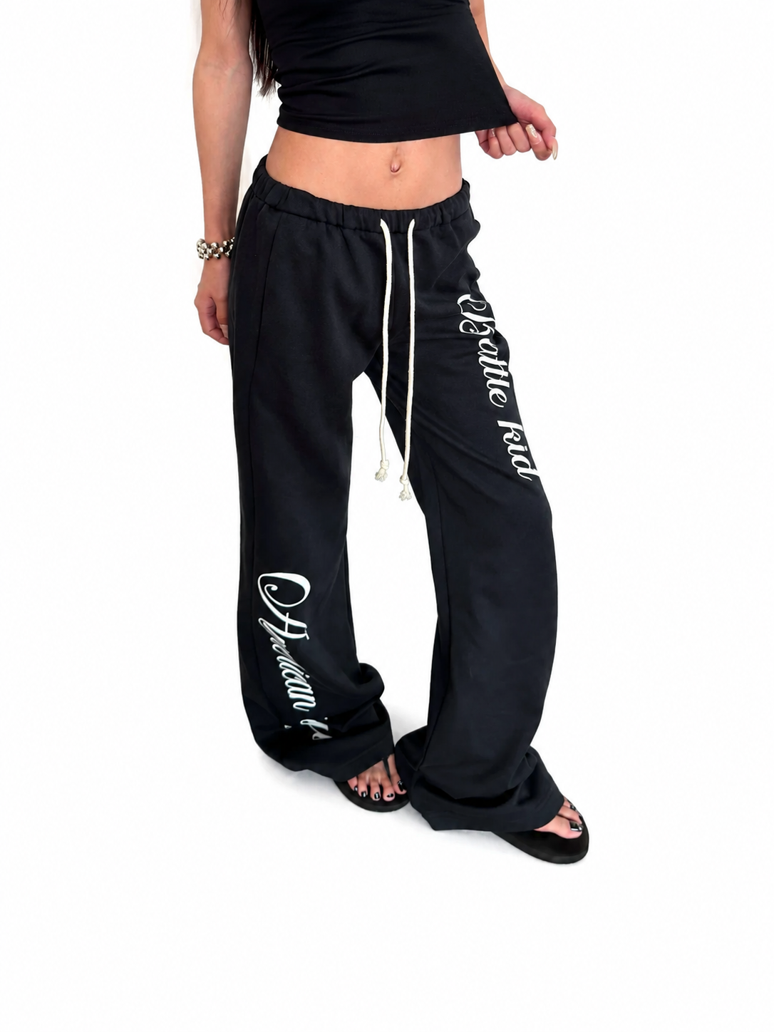 Ace Jolun black graphic wide-leg sweatpants front view