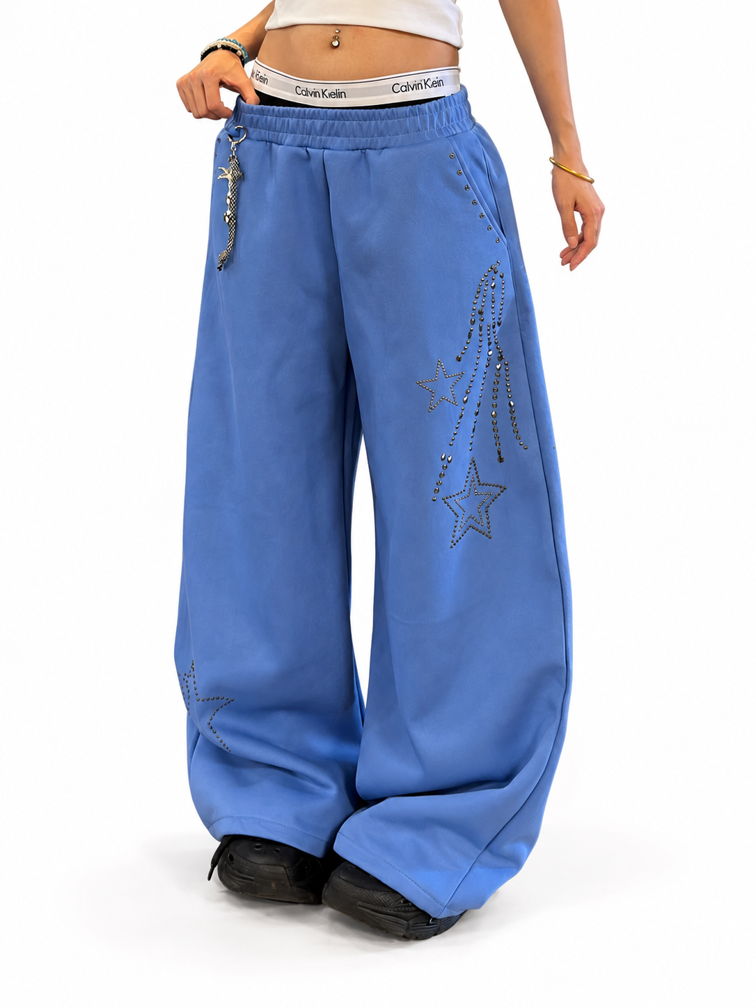 Ace Jolun blue studded star sweatpants front view